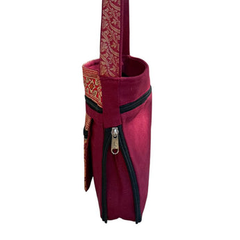 Bolso con cinta para llevar cruzada 