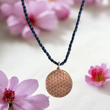 Collar de cobre con flor de la vida 